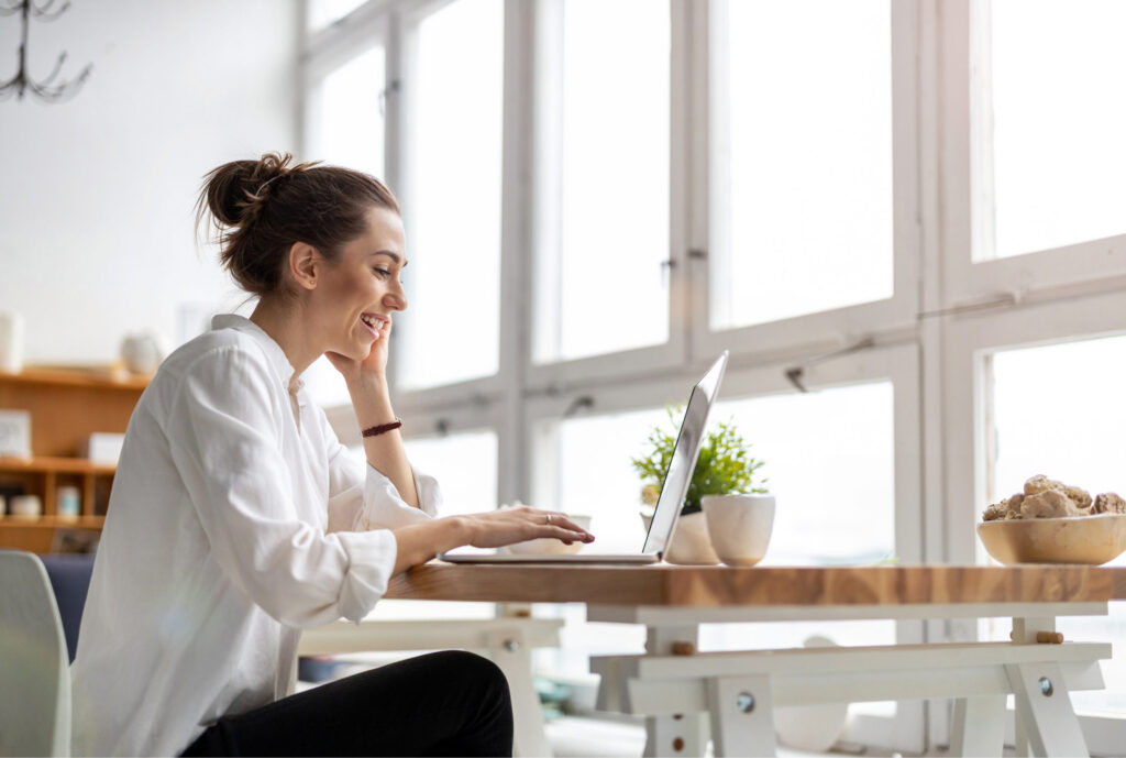 Woman using Actionstep Laptop